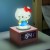 PP14451HK_Hello_Kitty_Light_Up_Alarm_Clock_lifestyle_light_ON_square.jpg