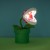 PP6348NN_Super_Mario_Piranha_Plant_Posable_Lamp_On_Square_Lifestyle_1.jpg